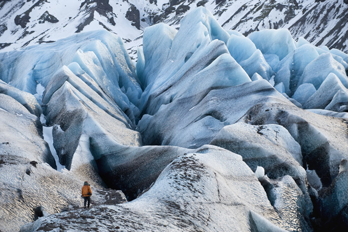 2.12.08 | James Balog. Iceland/Svnafellsjkull Glacier An EIS team member provides scale in a massive landscape of crevasses on the Svnafellsjkull Glacier in Iceland.